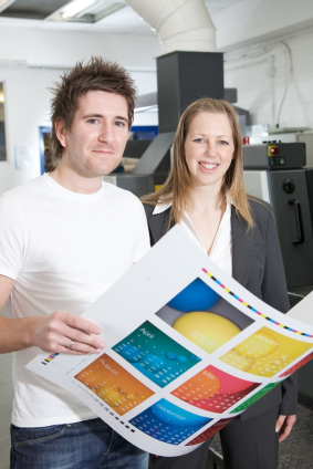 Showing printing samples to a customer